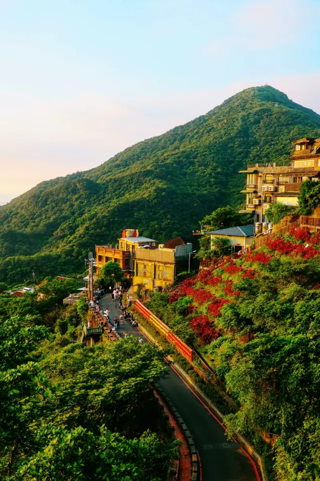 A hillside town with a winding road
