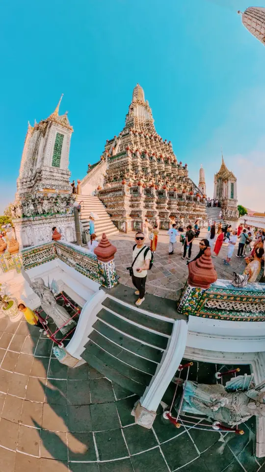 A temple spire seen through a fisheye lens