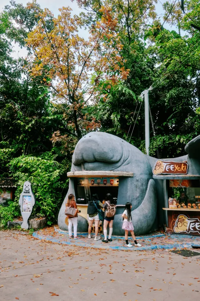 A kiosk built inside a giant whale sculpture